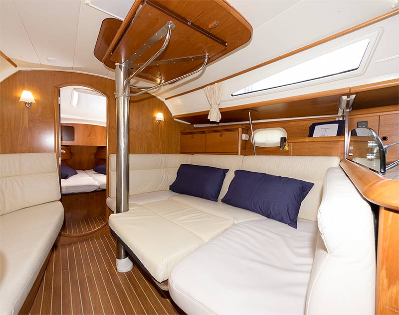 Saloon with table raised and double berth